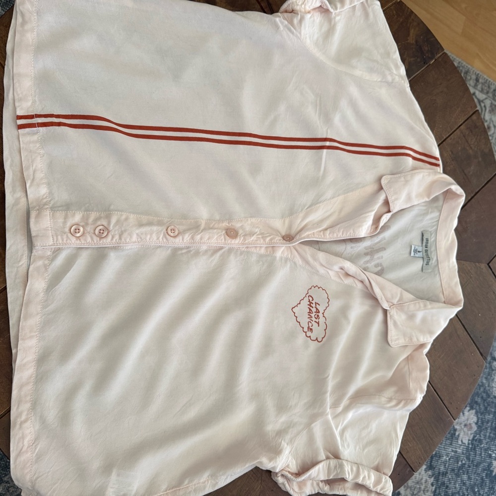 Urban Outfitters women's light peach with darker red graphic . Size large